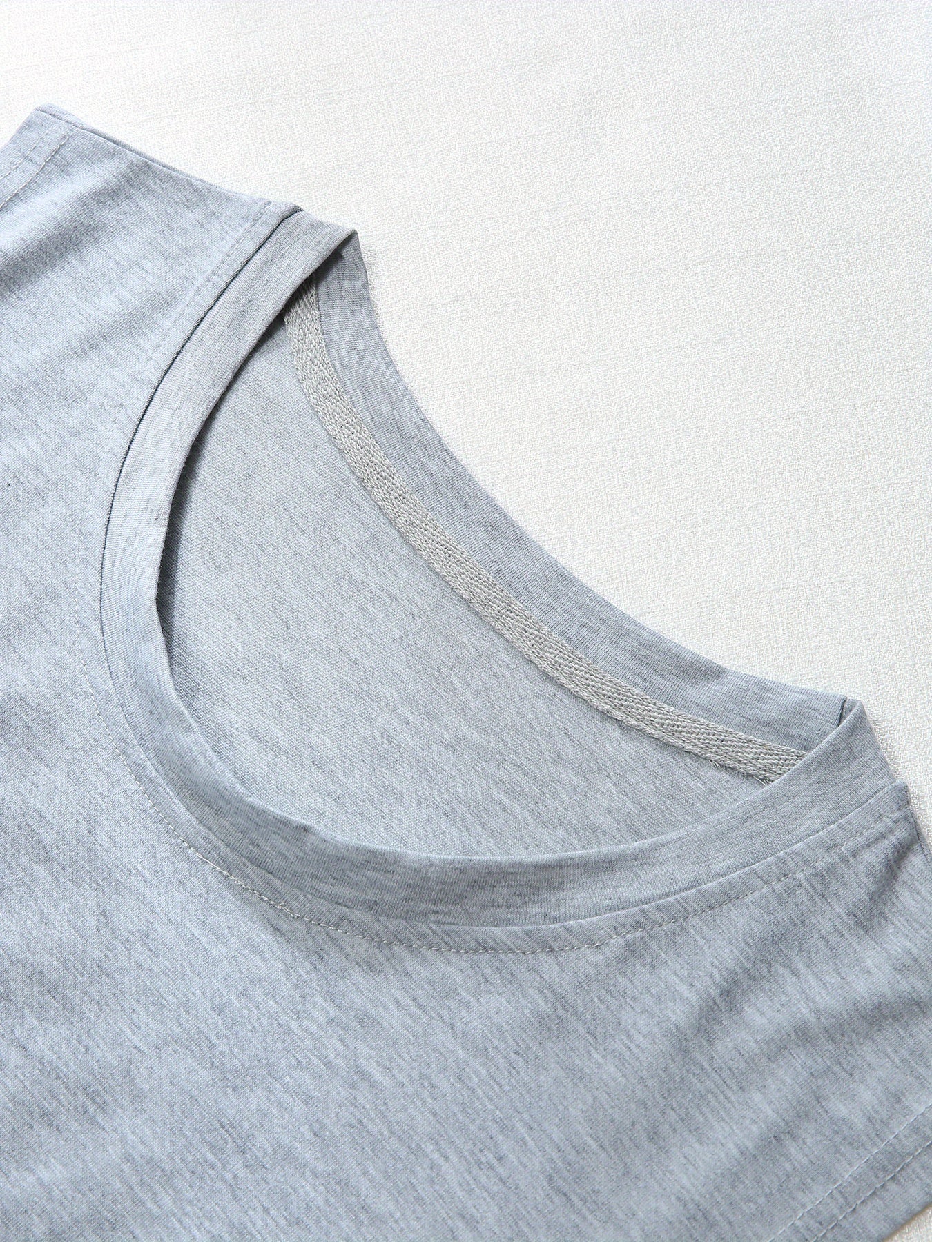 Débardeur de sport d'été pour homme, coupe ajustée, en polyester et élasthanne, sans manches, col ras du cou, séchage rapide, respirant.